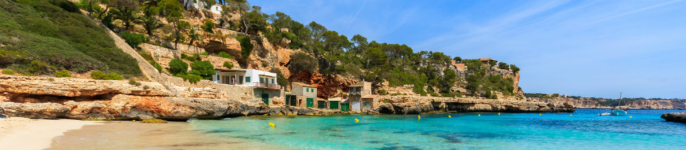 Wave on sandy beach azure sea water, Cala Llombards, Majorca island, maljorka